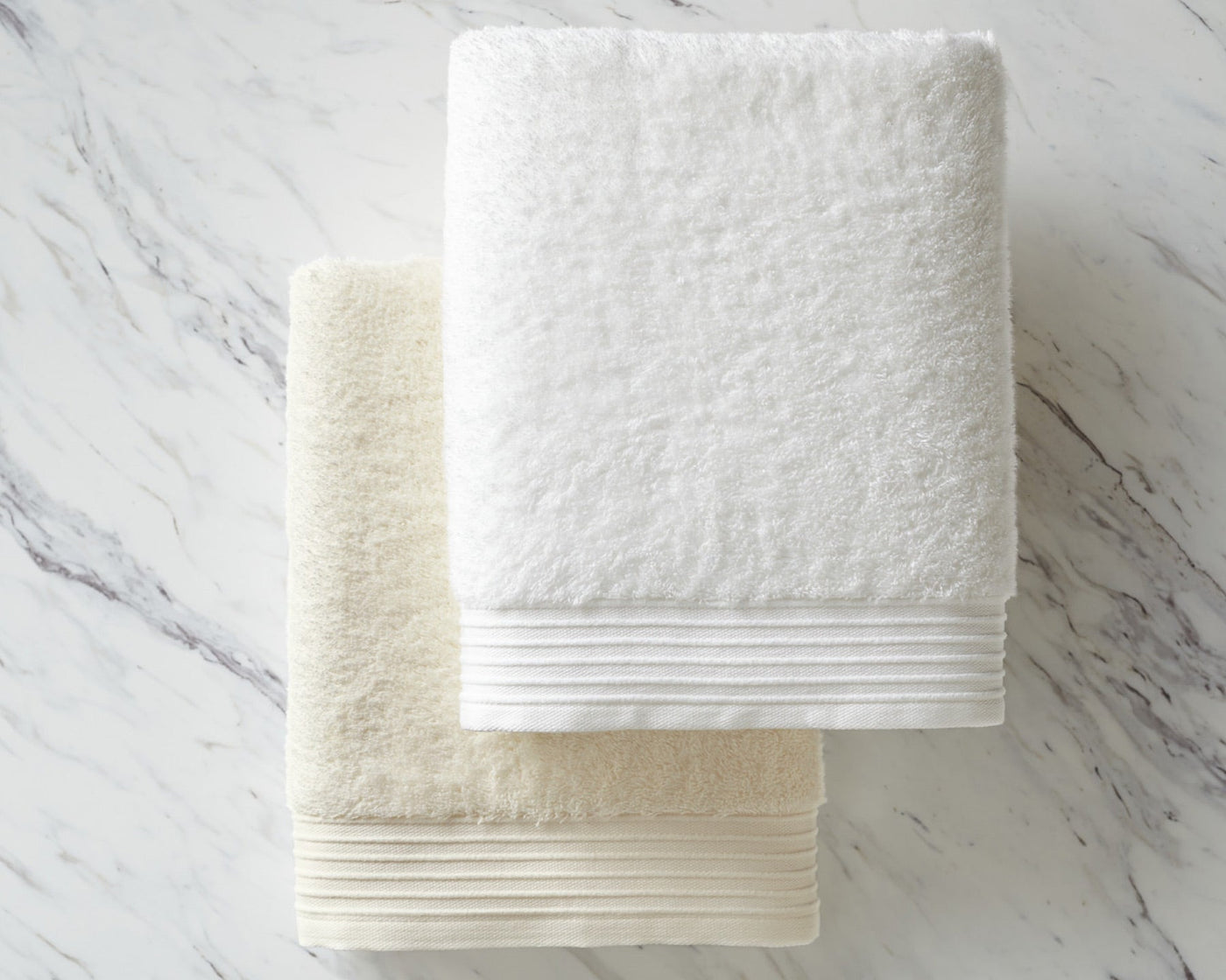 plush and absorbent bamboo towels in white and ivory by Peacock Alley