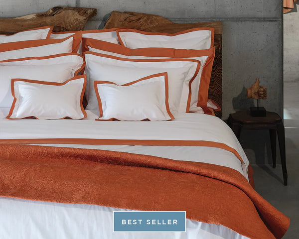 Photo of best selling Hella bedding and sheest with colorful trim.