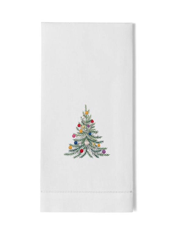 White linen guest towel with embroidered colorful ornament-decorated Christmas tree and hemstitch border.