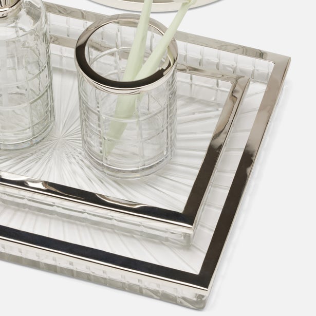 Argos glass and polished silver bath trays stacked, with matching tumbler holding stems.