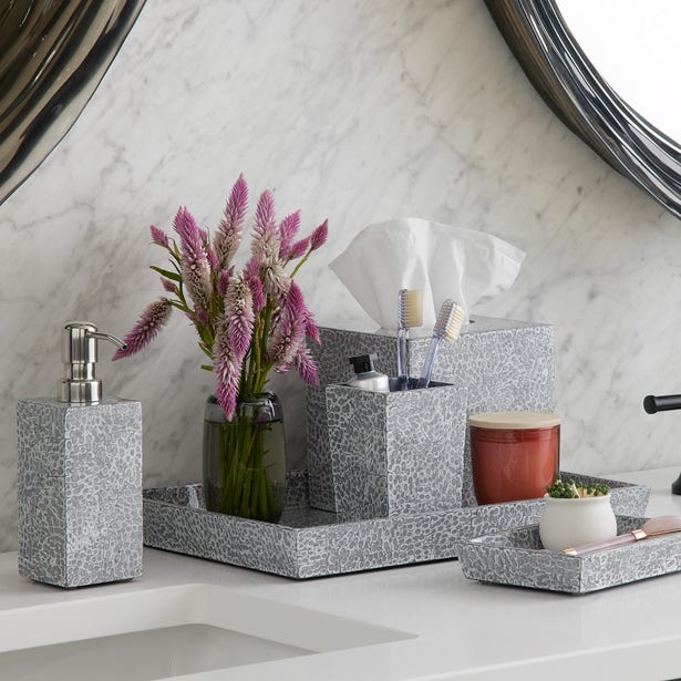 Mike & Ally Callas silver mosaic bath accessories styled on marble vanity.