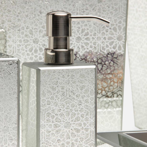 Silver geometric mosaic soap dispenser with brushed nickel pump, styled with matching bath accessories.