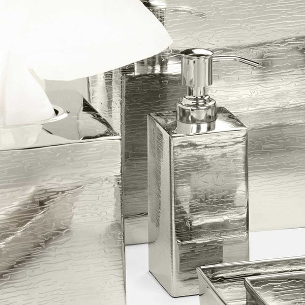 Elgin silver textured soap dispenser with pump, styled in a bathroom setting.