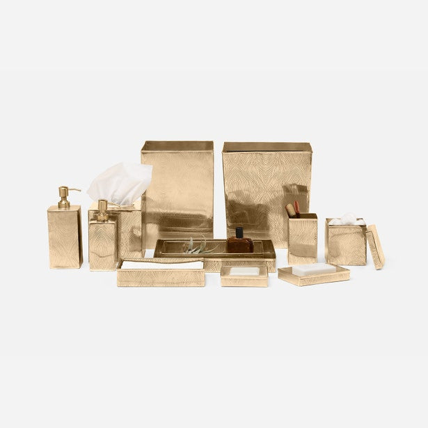 Humbolt gold-tone bath accessory collection arranged on neutral background.