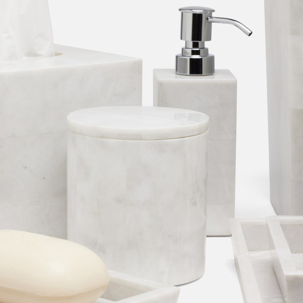Milan white marble bathroom accessories with soap dispenser, canister, and tray.