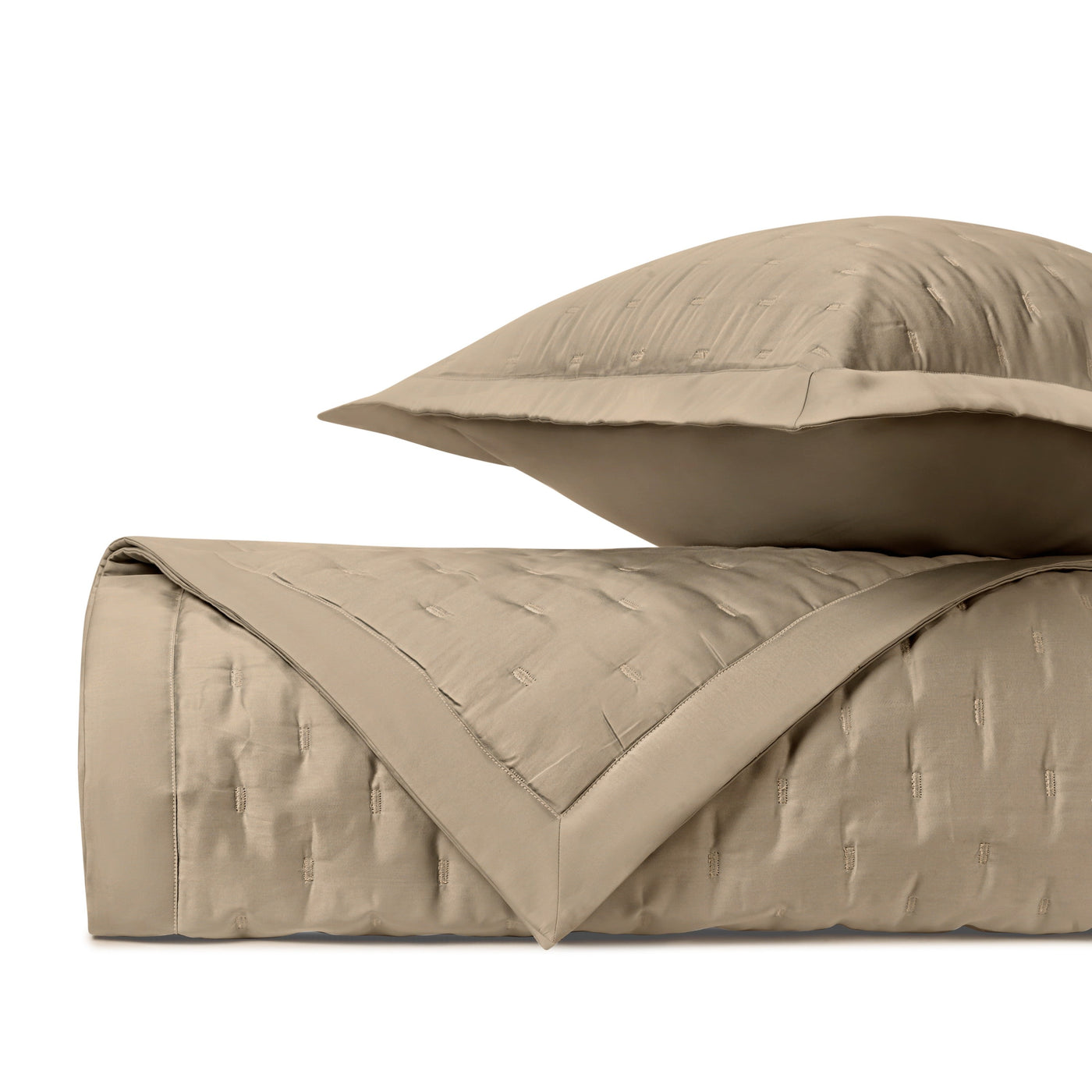 Home Treasures Fil Coupé quilted coverlet and sham in khaki with woven pattern.