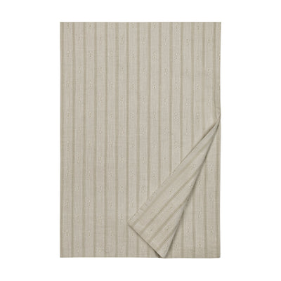 Glory allover striped linen flat sheet in natural with floral detail, corner folded back.