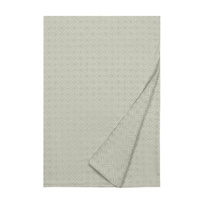 Helena flat sheet in sage with woven diamond geometric pattern, folded corner detail.