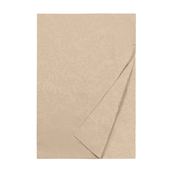 Ivy flat sheet in champagne with subtle tone-on-tone floral pattern, folded corner detail.