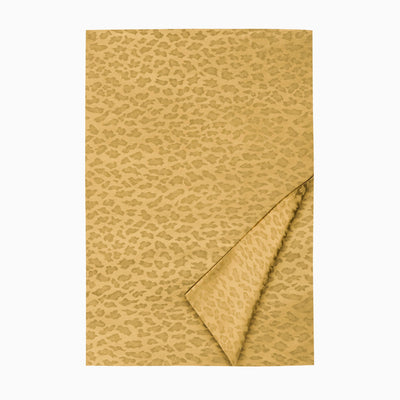 Jaguar saffron jacquard duvet cover with leopard spot pattern, corner folded back.