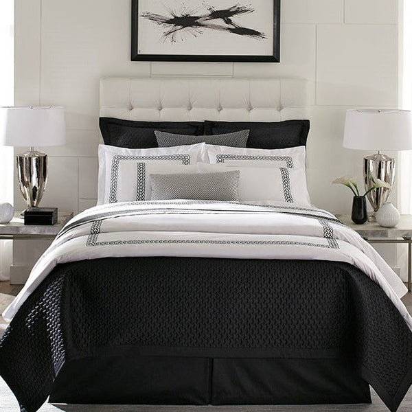 Home Treasures Links bedding collection in onyx and ivory with geometric border detail.