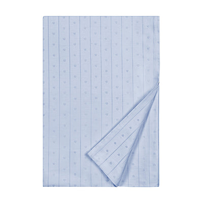 Sferra Little Hearts periwinkle flat sheet with woven stripe and heart pattern, corner folded back.