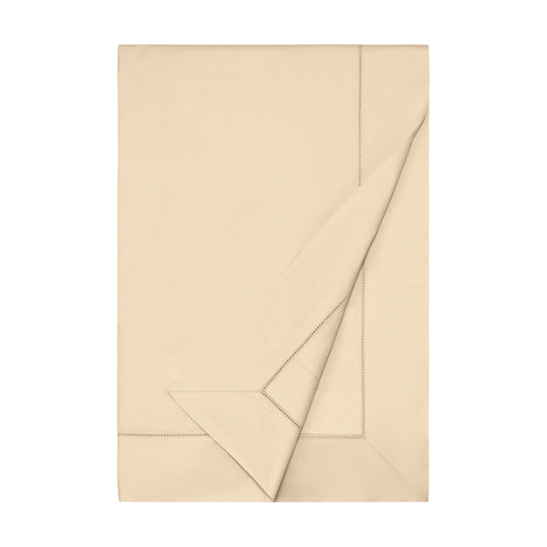 Home Treasures Miller champagne flat sheet folded with hemstitch border detail.