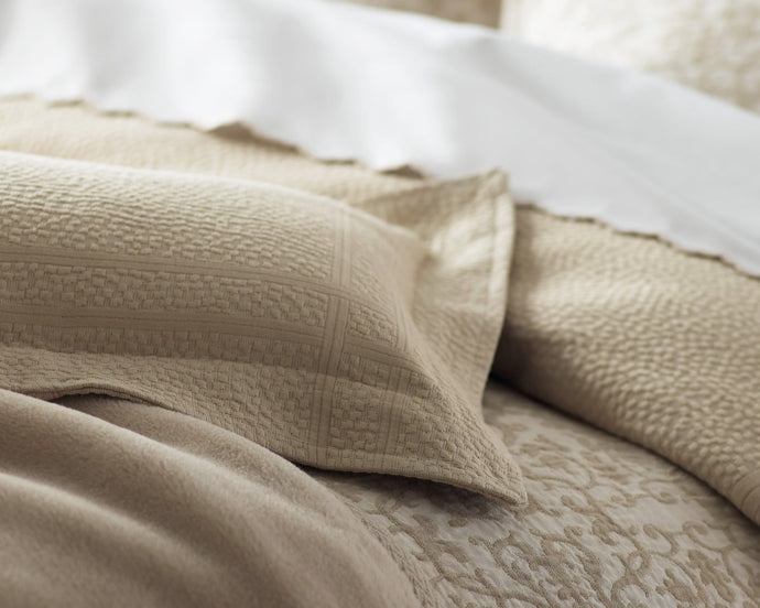 100% cotton Montauk coverlet and shams with a subtle pebble texture