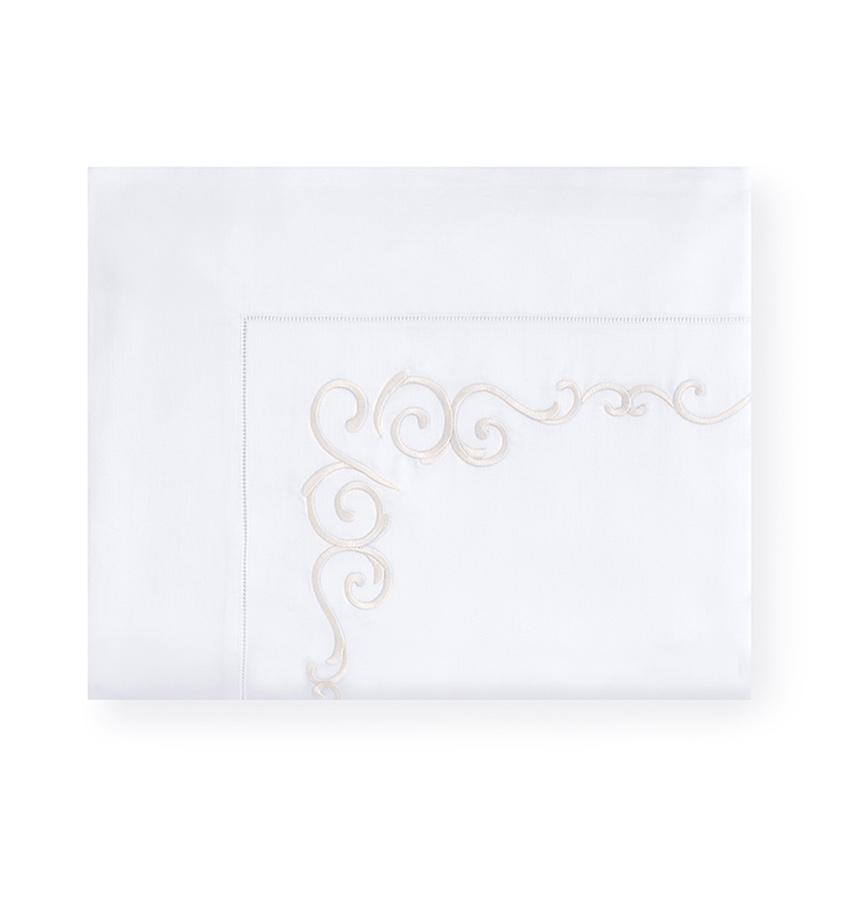 Sferra Giza 45 Severina white sheet set with champagne scroll embroidery.
