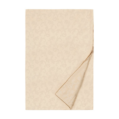 Sferra Splendor champagne damask flat sheet, folded with corner turned back.