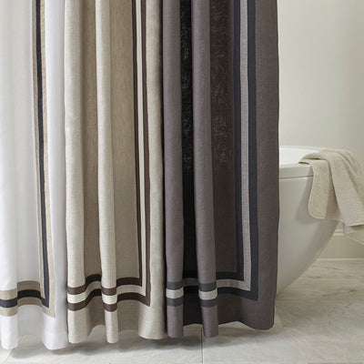 Torino linen shower curtain in ivory and charcoal vertical stripes with border hem.