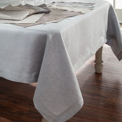 Zebra silver linen tablecloth on dining table with matching placemats and napkins.