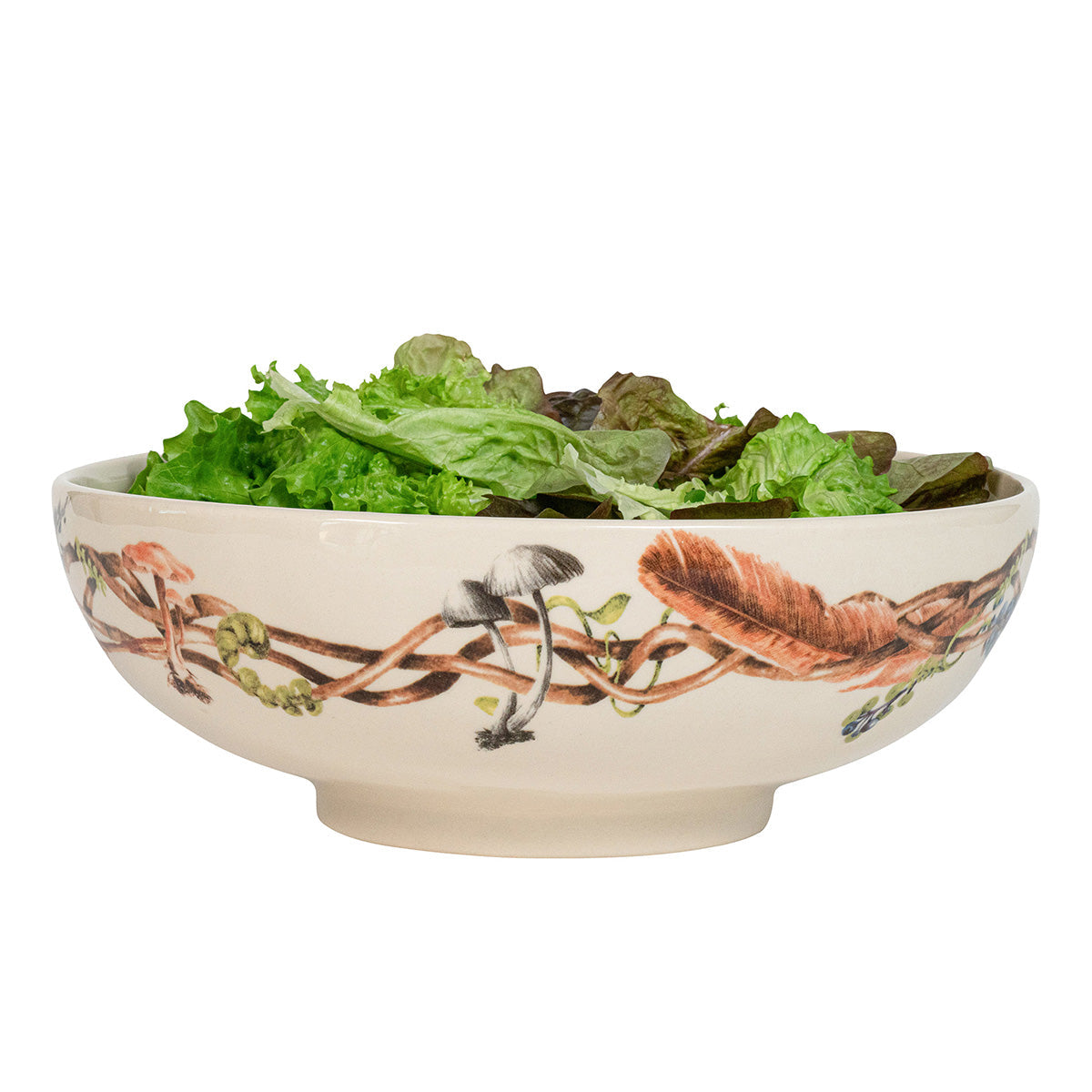 Juliska Forest Walk 12 inch serving bowl filled with green salad