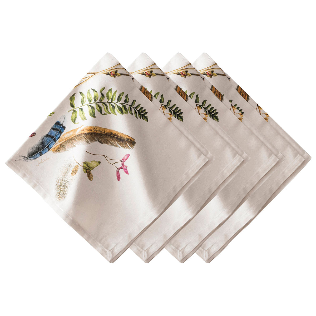 Juliska Forest Walk set of cream cotton napkins printed with feathers and ferns, folded and fanned