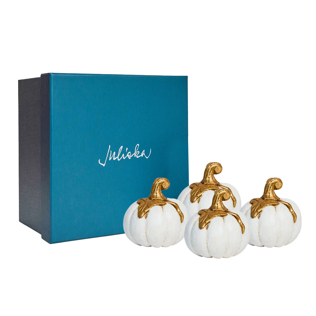 Juliska Forest Walk white and gold pumpkin place card holders beside a teal Juliska gift box
