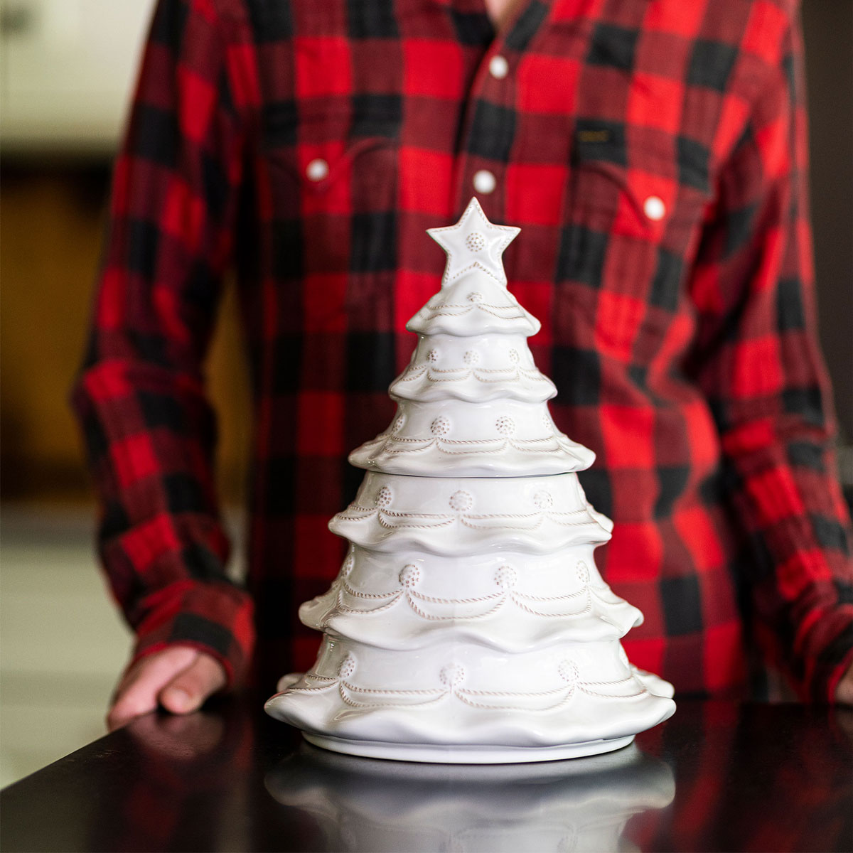 Whitewash Christmas tree cookie jar on a dark counter