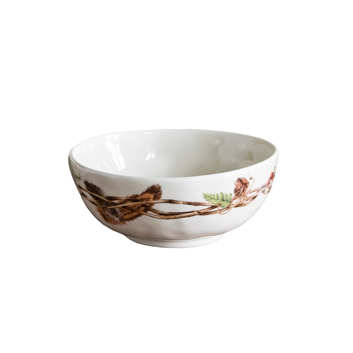 Juliska Forest Walk cream berry bowl from a low angle, showing the painted twig and berry band