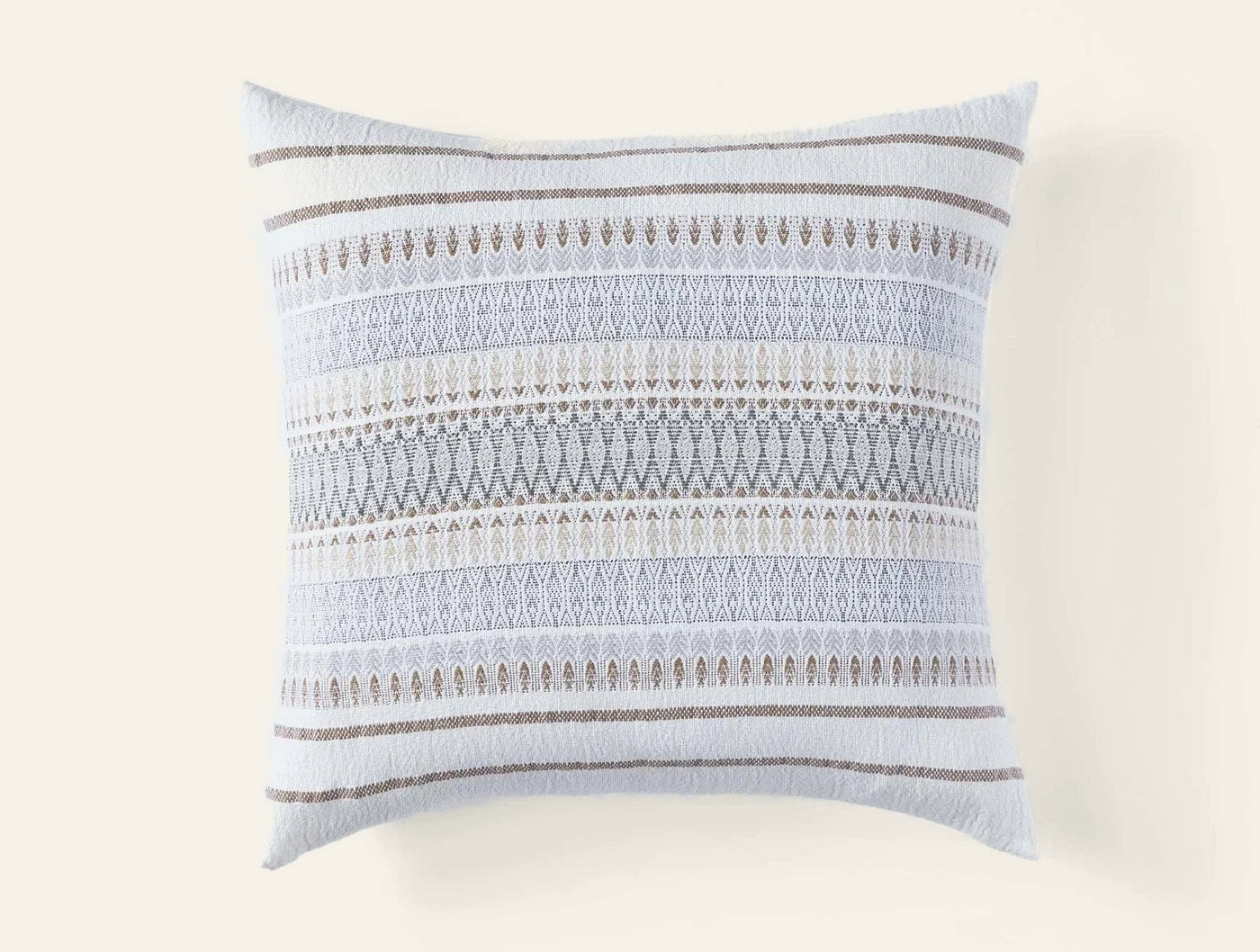Coyuchi Lost Coast decorative pillow in ivory with blue and taupe woven stripe pattern.