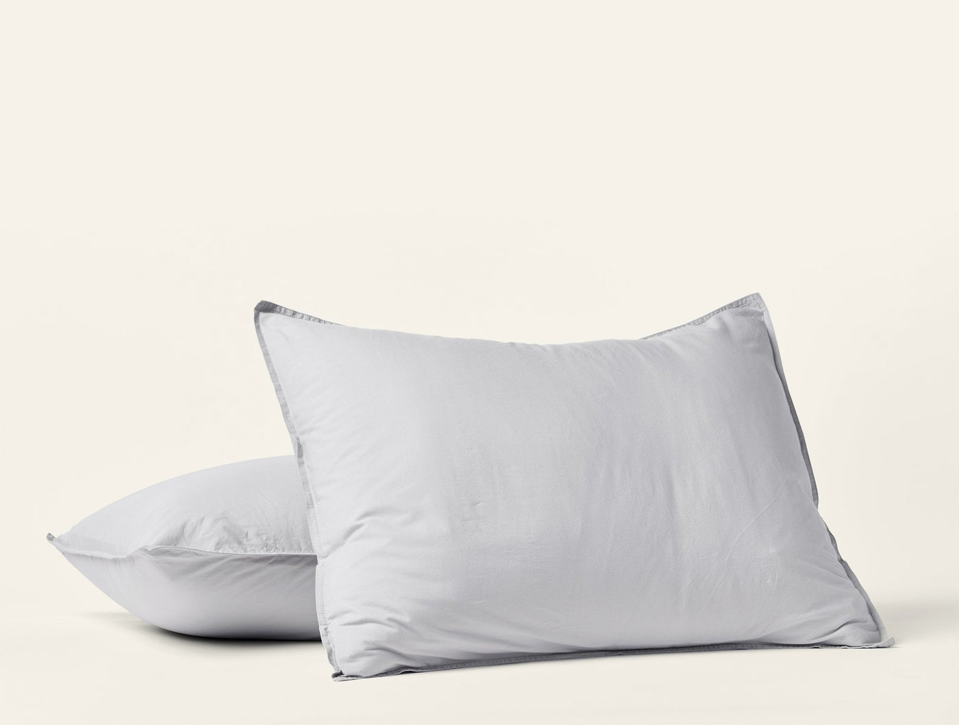 Two Coyuchi Crinkled Percale shams in silver-grey stacked against a white background.