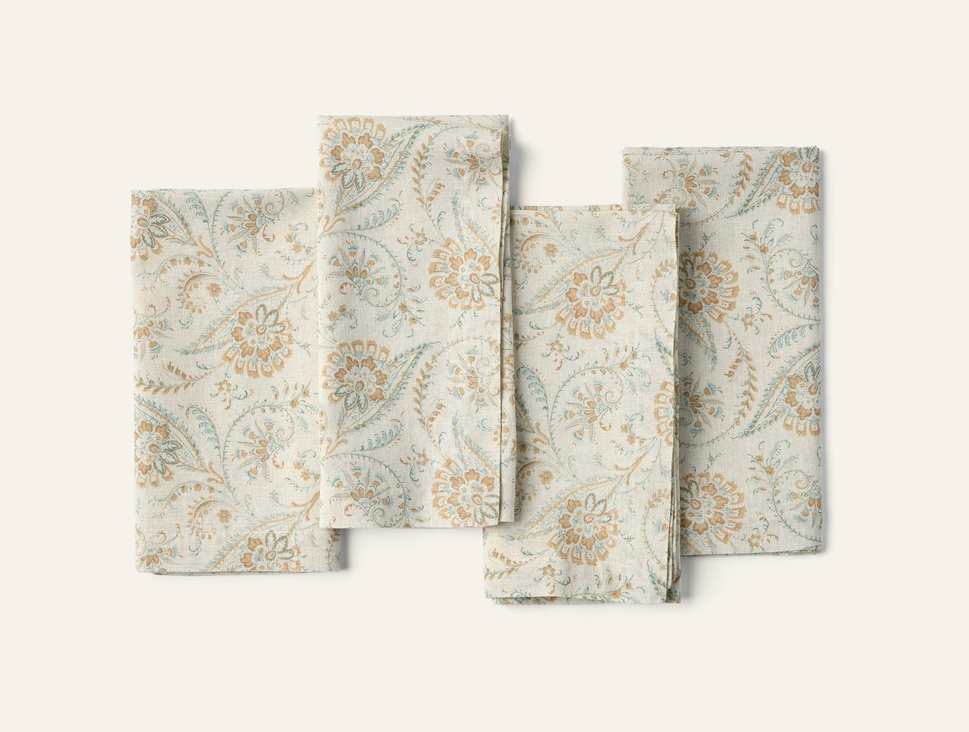 Coyuchi Ponderosa Print napkin set of four, sage floral botanical pattern on ivory linen.
