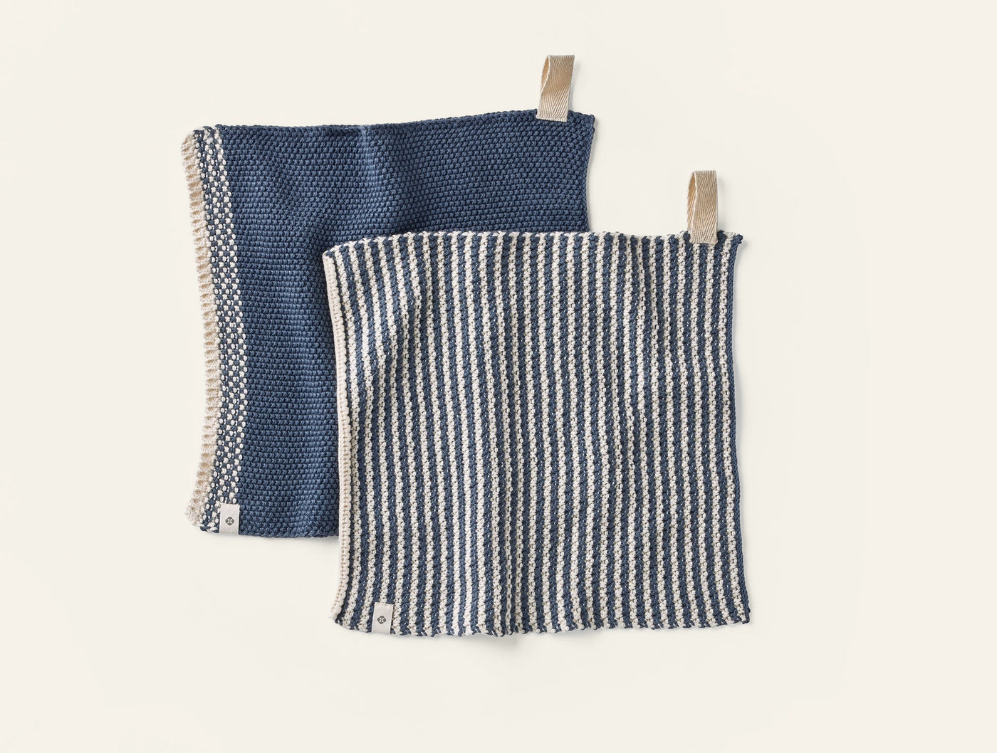 Coyuchi Shasta dish cloth set, navy and striped cotton, clipped flat on white background.