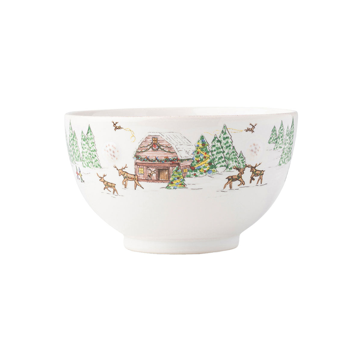 Juliska Berry & Thread North Pole cereal bowl painted with a log cabin, evergreens and reindeer