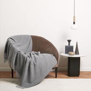 Photo of the The Pure Cashmere Throw ensemble.