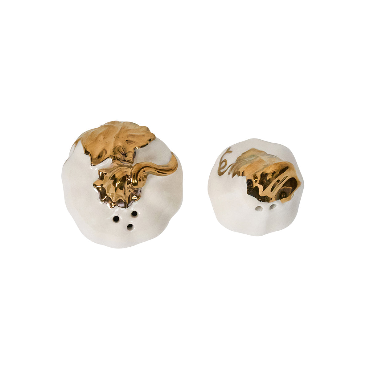 Juliska Forest Walk pumpkin salt and pepper shakers viewed from above, showing the pour holes