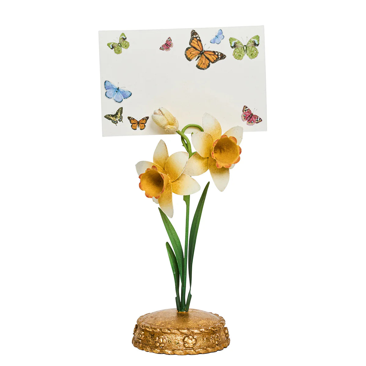 Close-up of Juliska Meadow Walk place card held by a daffodil-shaped metal stand on a gold base.