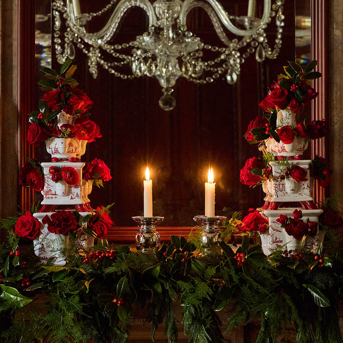 Ruby Winter Frolic tulipieres with roses and candles on a mantel