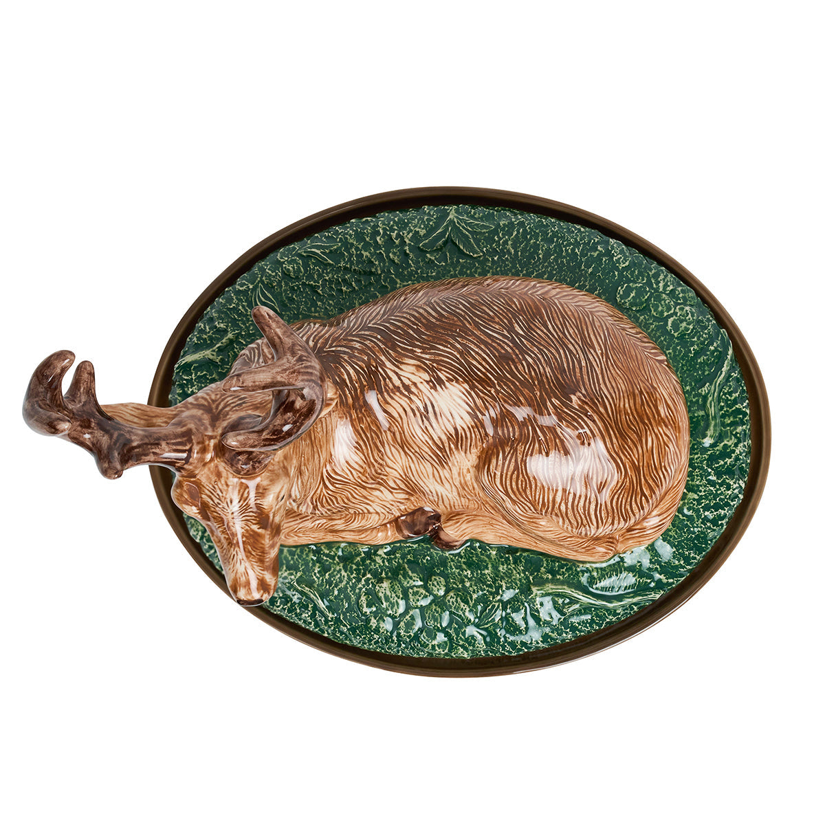 Juliska Forest Walk stag baker lid seen from above on an oval green grass base