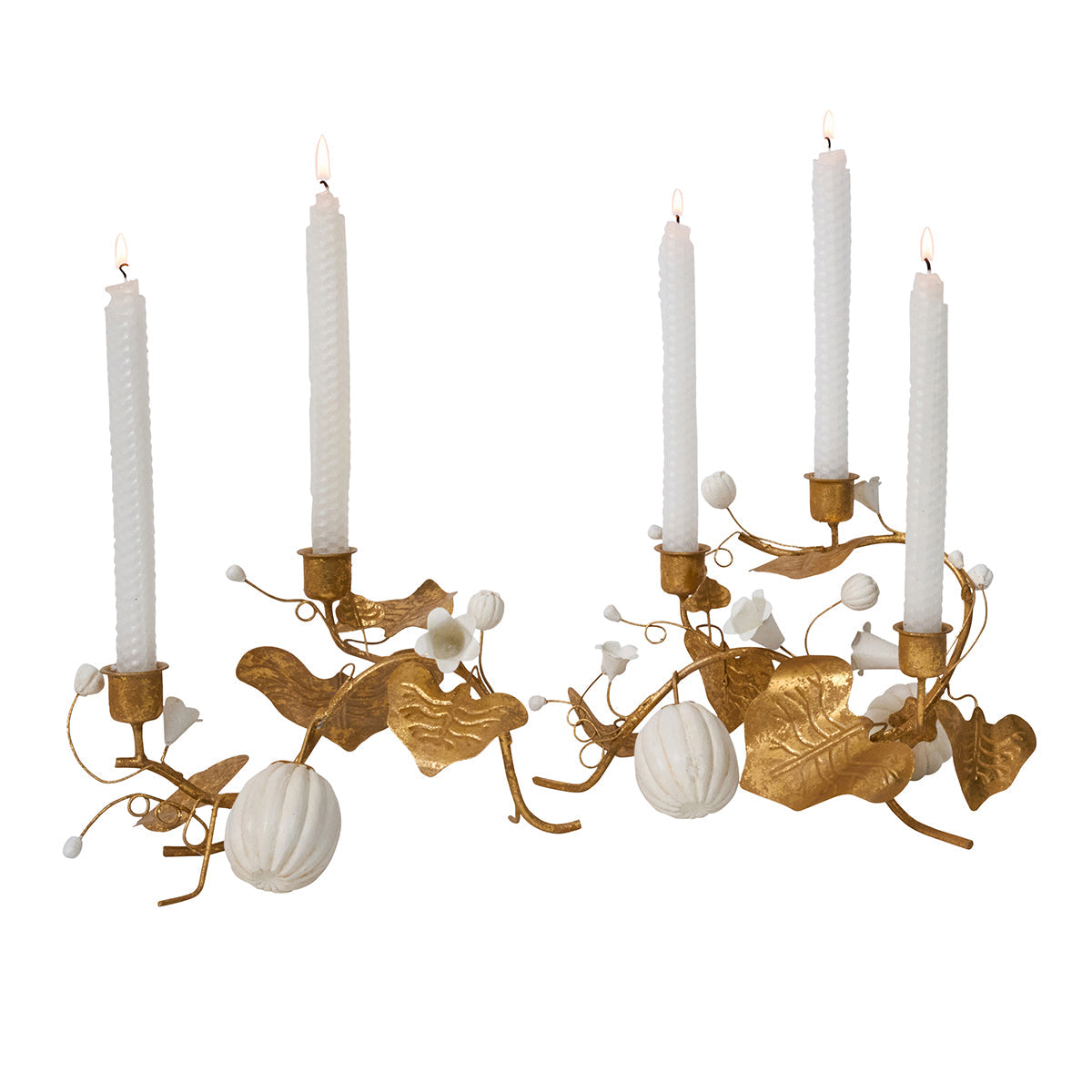 Two Juliska Forest Walk gold pumpkin and vine double candlestick holders with white taper candles