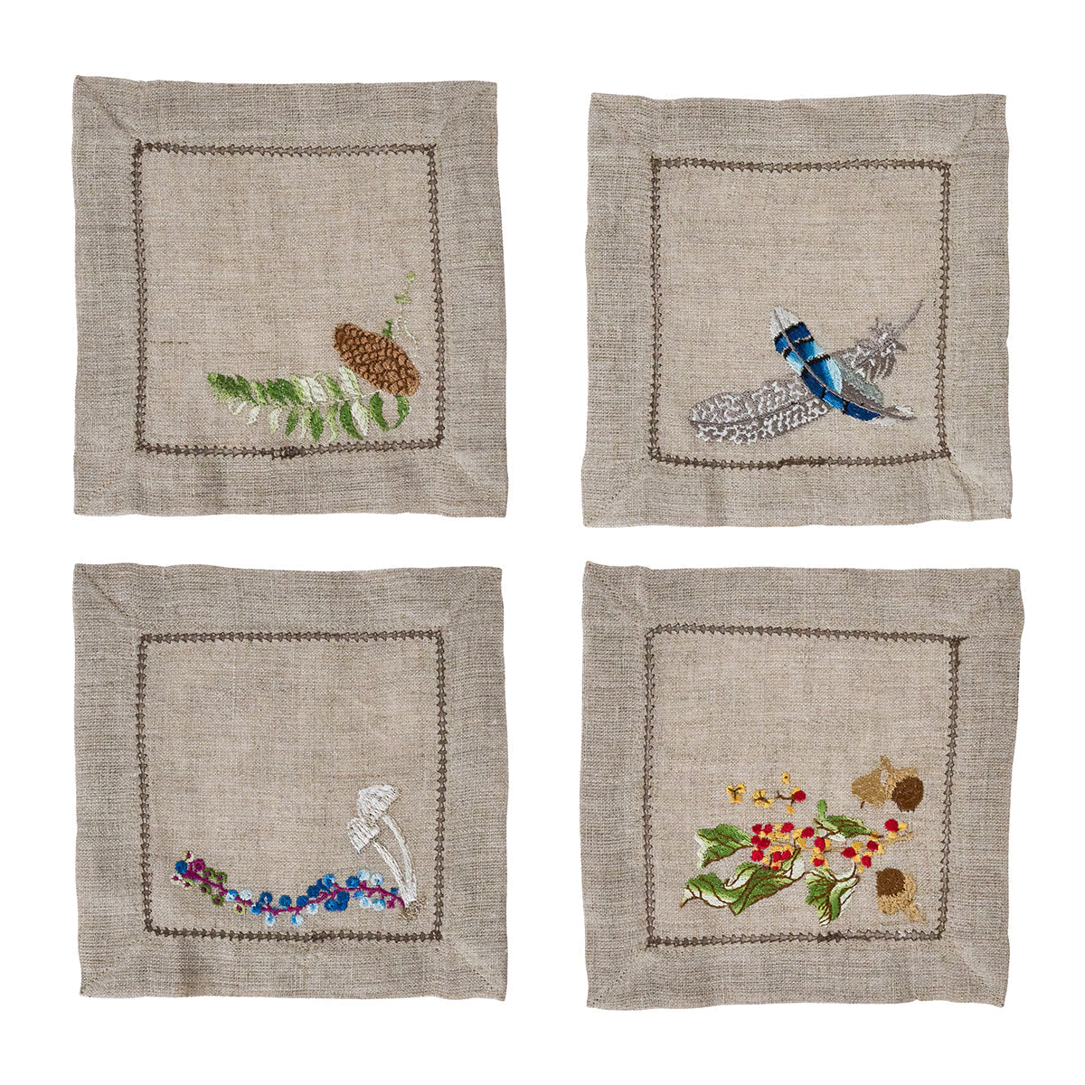 Juliska Forest Walk set of four linen cocktail napkins, each embroidered with a different woodland motif