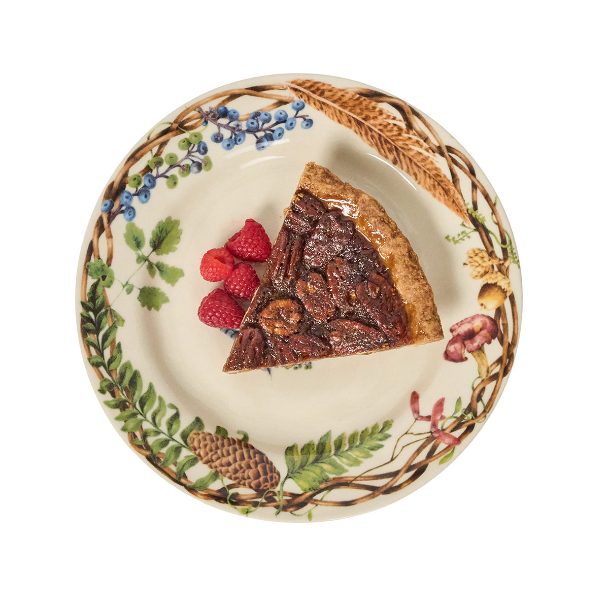 Juliska Forest Walk stag salad plate with a slice of pecan pie and raspberries