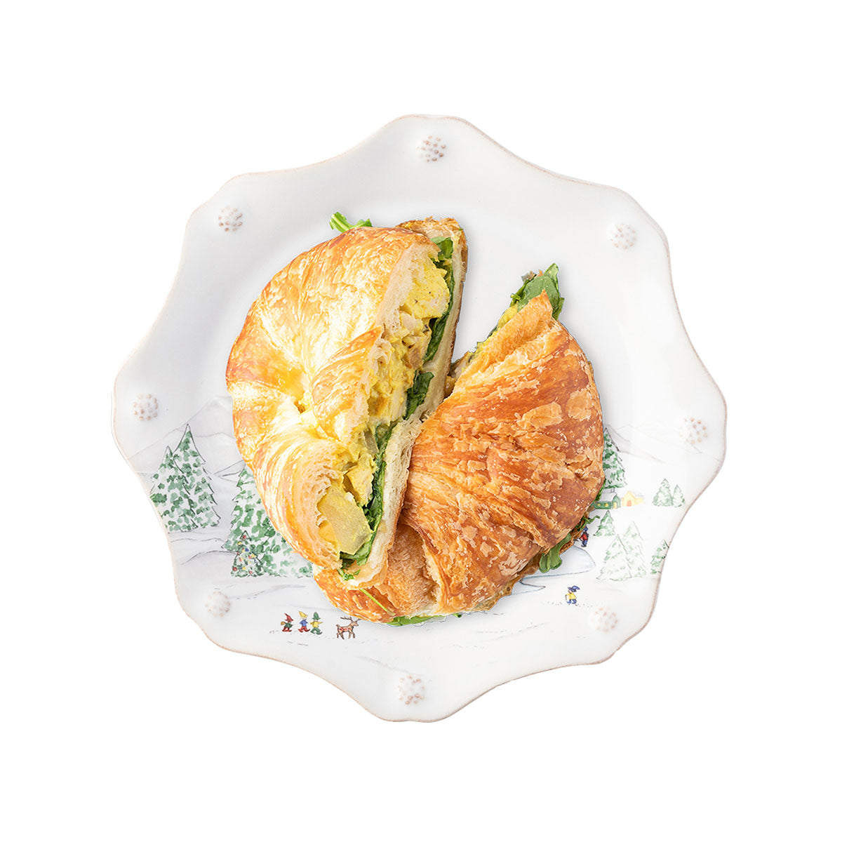North Pole salad plate holding a croissant sandwich