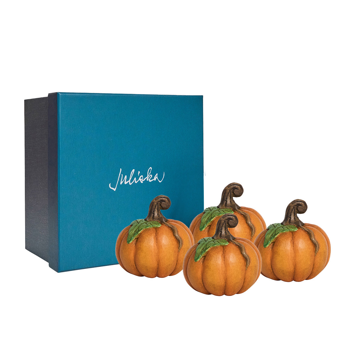 Juliska Forest Walk orange pumpkin place card holders beside a teal Juliska gift box