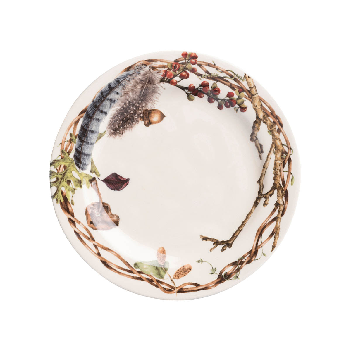 Juliska Forest Walk party plate with a wreath of twigs, a blue feather and red berries