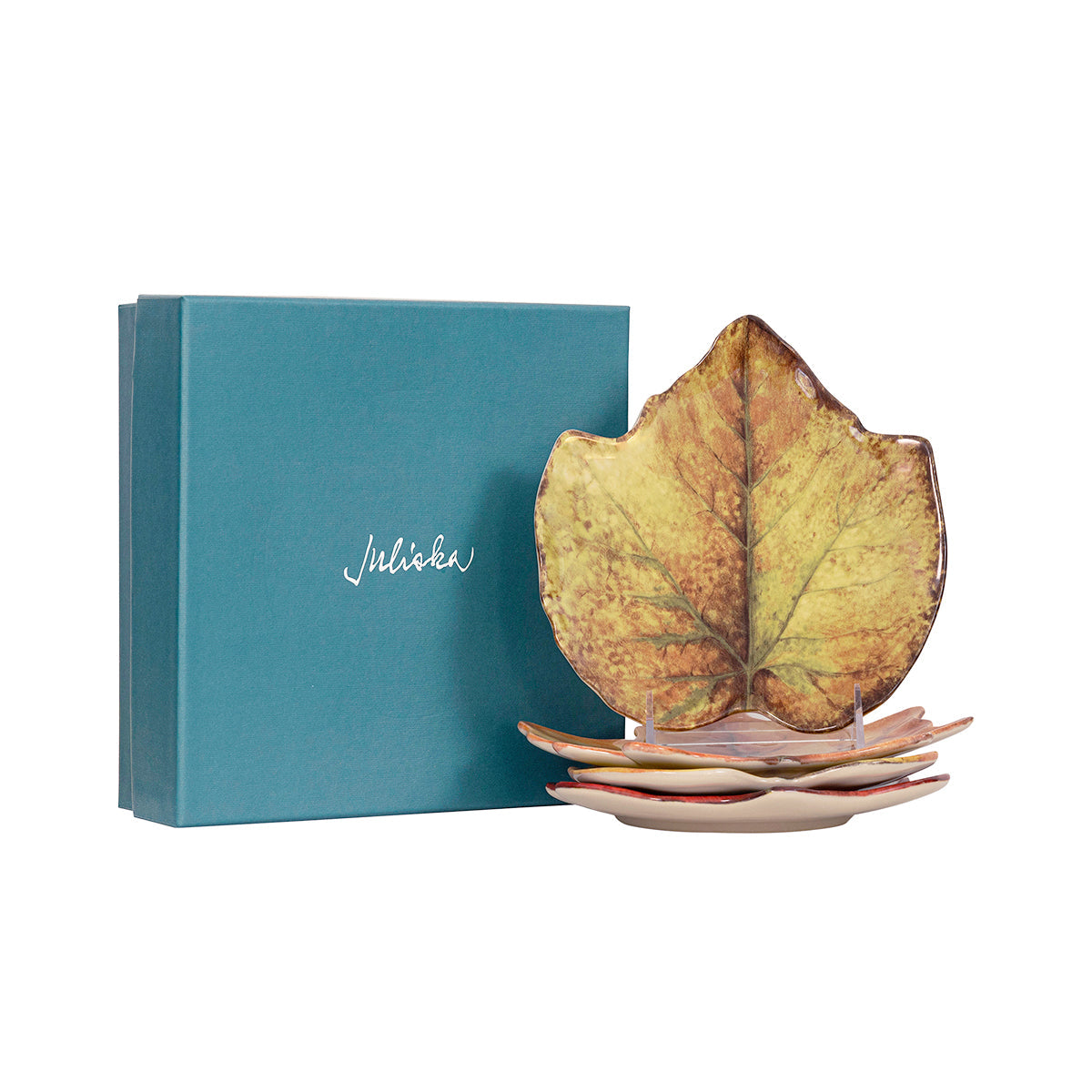 Juliska Forest Walk leaf cocktail plates stacked beside a teal Juliska gift box