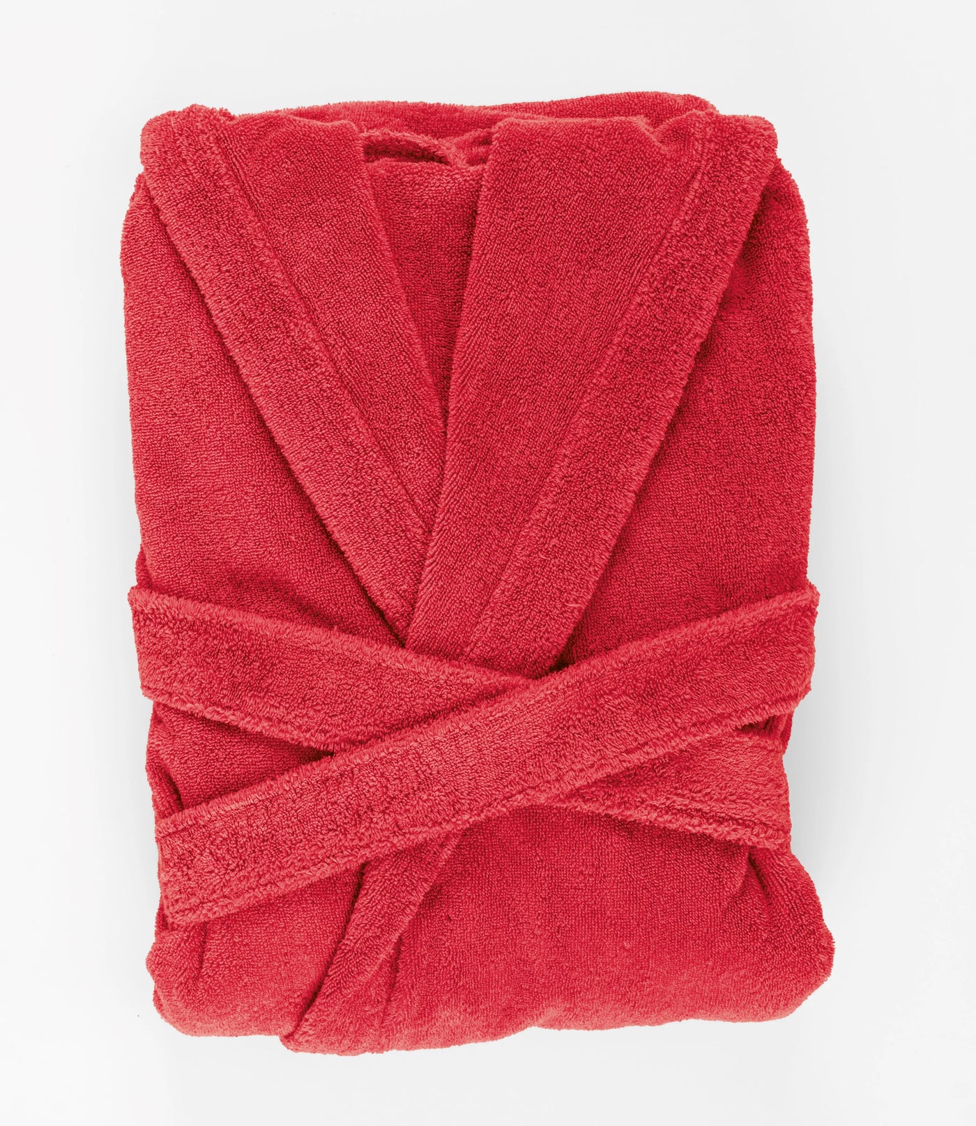 Red robe folded on a white background