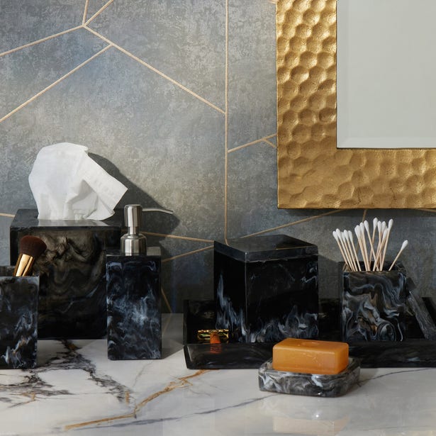 Pigeon & Poodle Abiko bath accessories in black marble resin styled on a vanity countertop.