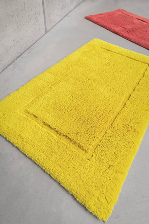 Photo of the Must | Square Bath Rug ensemble.