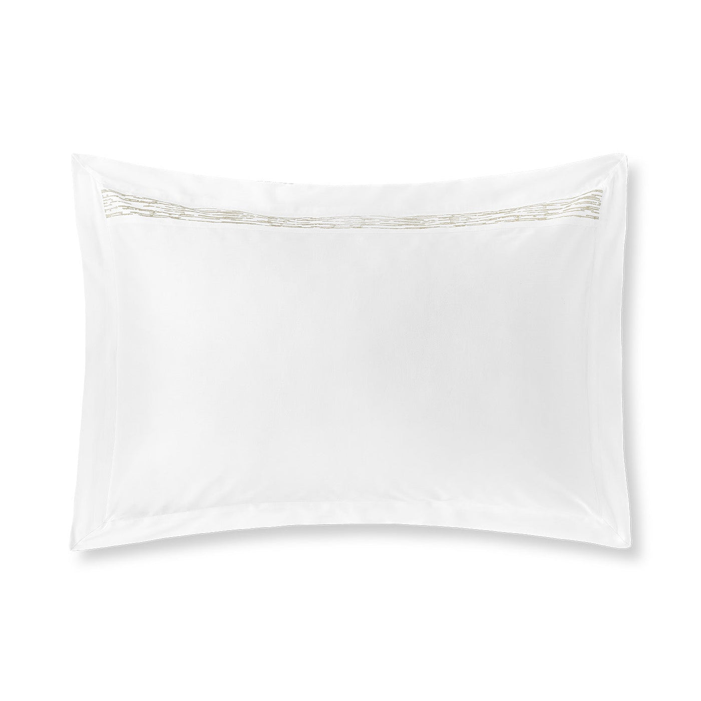 Close-up of ivory pillow sham with embroidered geometric border detail in sand tones.