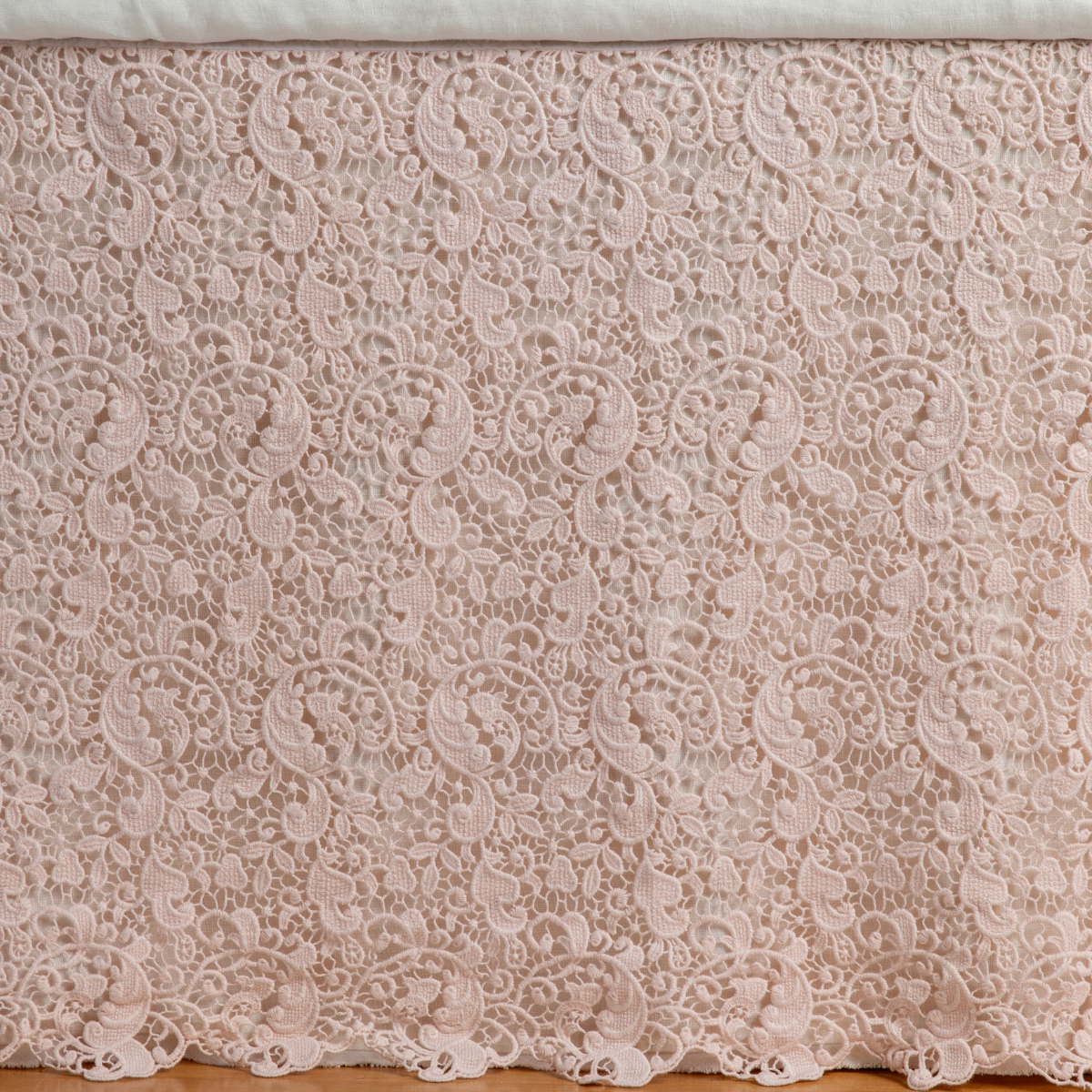 Close-up of Bella Notte Allora bed skirt in Pearl, intricate floral lace pattern detail.