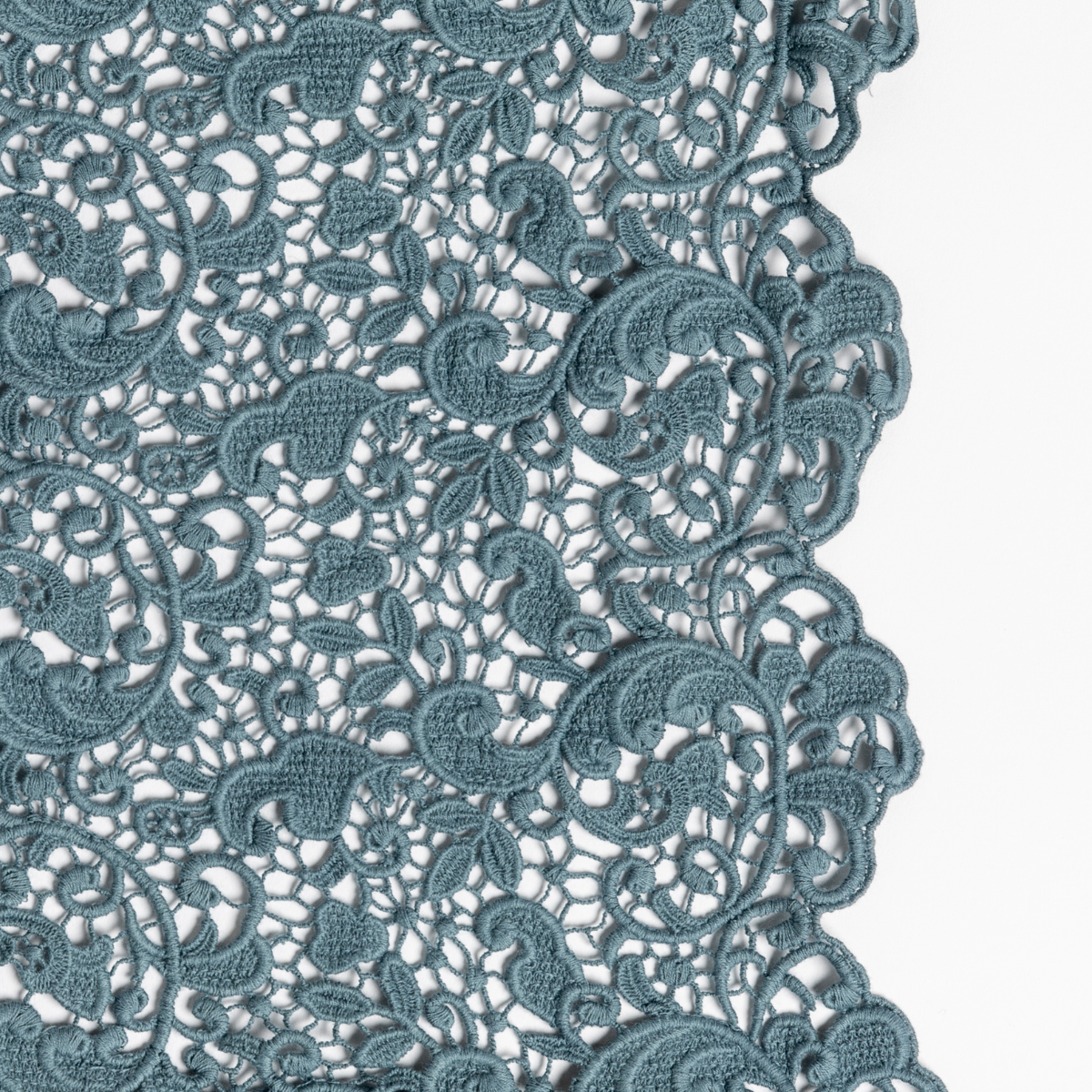 Close-up of Cenote lace trim detail on Bella Notte Allora bed skirt, intricate floral crochet edge.